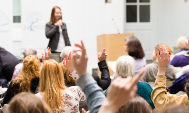 Stock photo - person speaking to a crowd