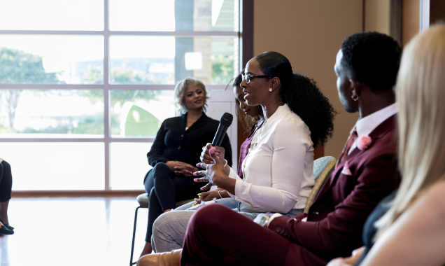 Woman speaks during a conference