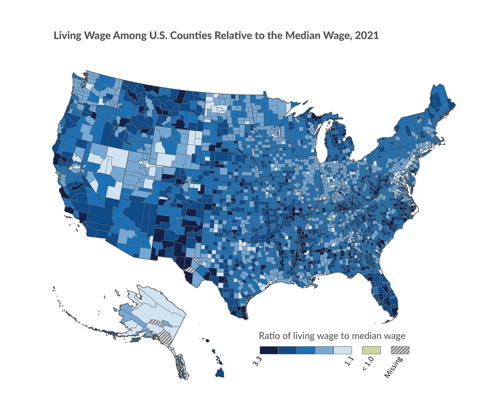 Map of the US showing counties in various shades of blue indicating the ratio of living wage to median wage