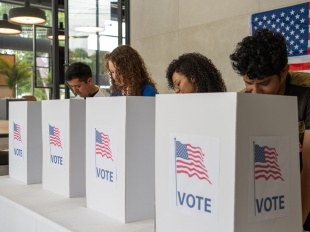 Four people voting